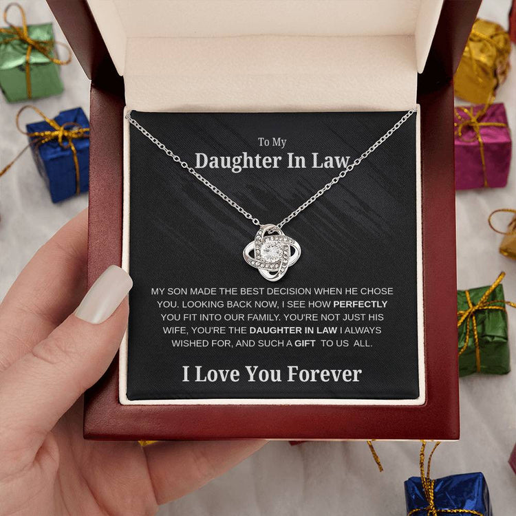 “Daughter-in-Law Love Knot Necklace with cubic zirconia pendant in mahogany-style luxury box and message card – meaningful jewelry gift”