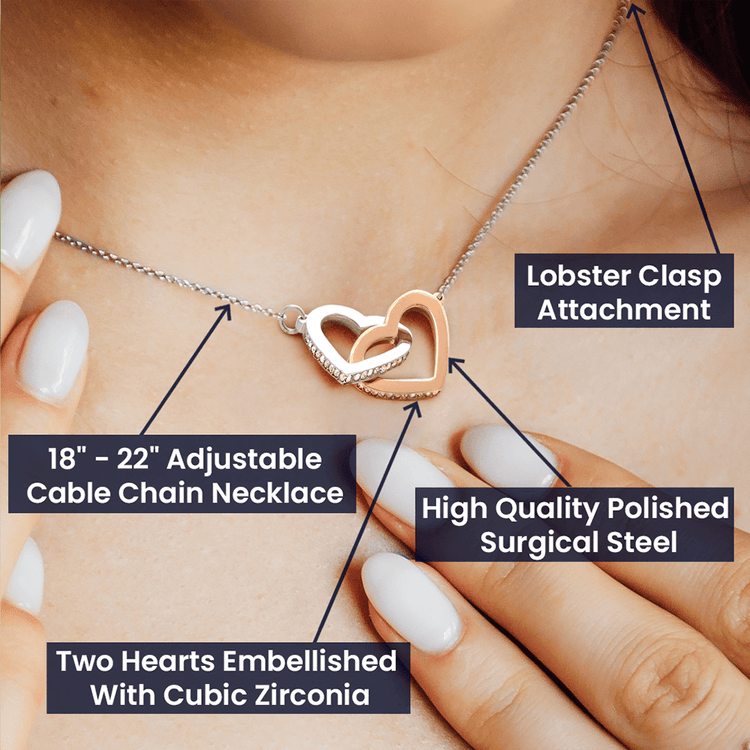 "Adjustable interlocking hearts necklace with cubic zirconia stones, lobster clasp, and surgical steel chain"