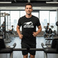 Runner wearing Motivation T-Rex Fitness Shirt while running on treadmill – Funny Motivational Gym Tee