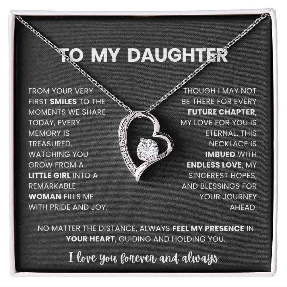 Necklace with heart design and sentimental message on a black card