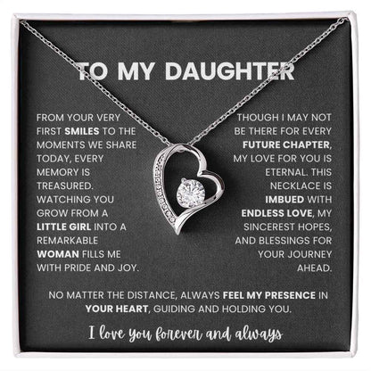 Necklace with heart design and sentimental message on a black card