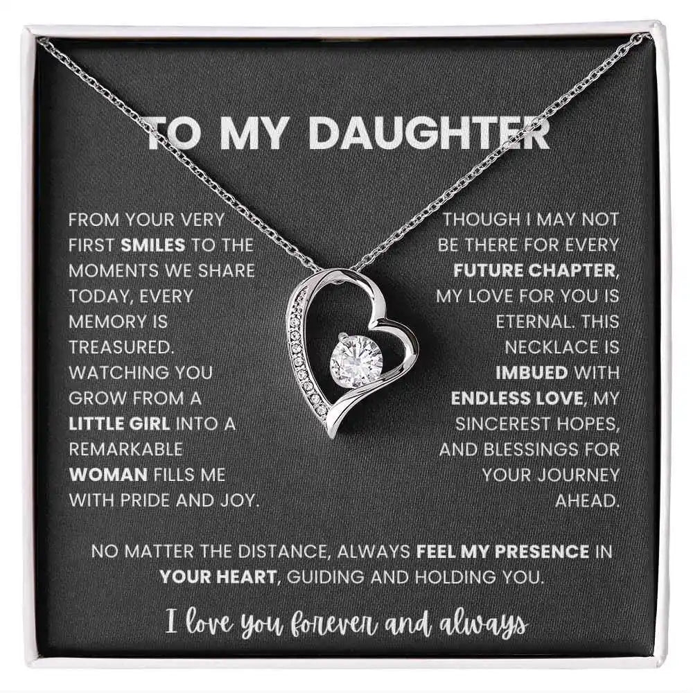 Necklace with heart design and sentimental message on a black card