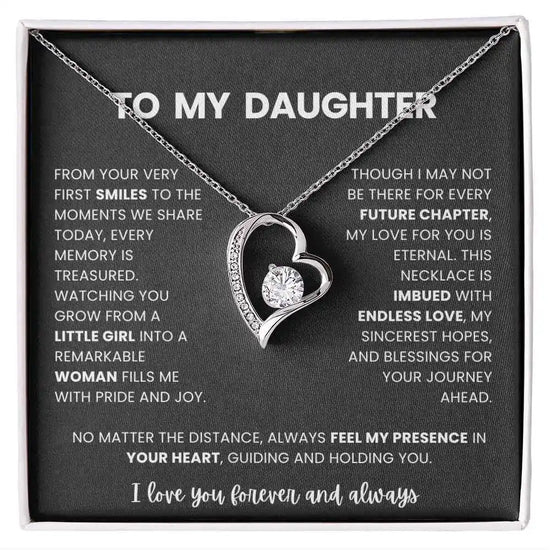 Necklace with heart design and sentimental message on a black card