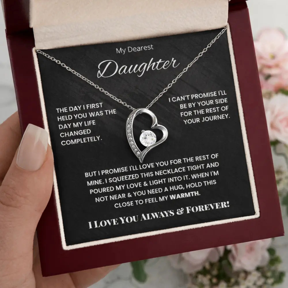 Heart-shaped necklace with sentimental message card for daughter in a mahogany box