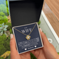 "Elegant Love Knot Necklace for wife with heartfelt message card from husband, silver design in gift box"