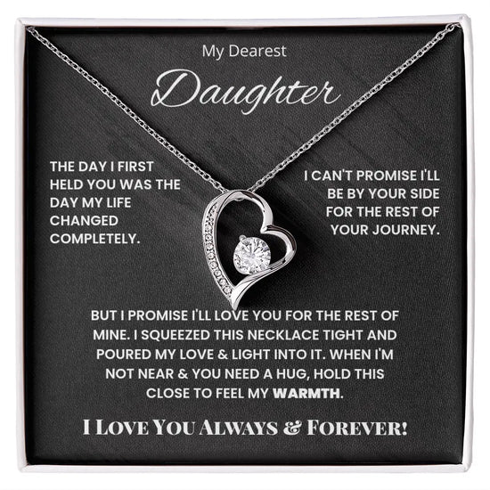 Heart-shaped necklace in a gift box with sentimental message for daughter