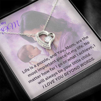 "Silver heart necklace with cubic zirconia pendant on sentimental ‘To My Mom’ message card inside gift box"